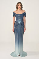 Woman wearing a blue off-shoulder evening gown on a white background