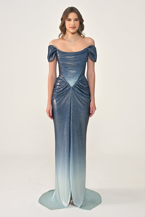 Woman wearing a blue off-shoulder evening gown on a white background