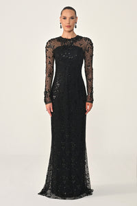 Black sequin evening gown on a white background