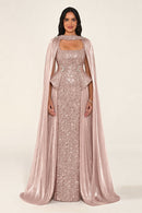 Celestara Dress in Rose Pink: sequin column gown with a square neckline, peplum hip detail, stone-embellished waist and a flowing organza cape