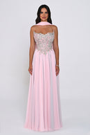 A woman modeling a floor-length formal gown from the back against a light gray studio background. The dress has a pale pink pleated skirt, a matching pink halter-style upper section, and a heavily embellished bodice with silver and pink floral embroidery.